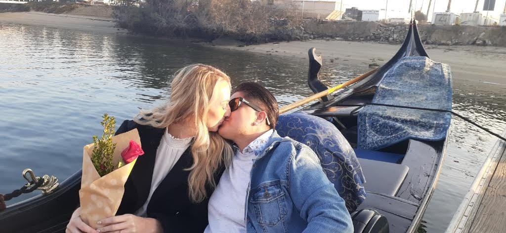 two women kissing in gondola