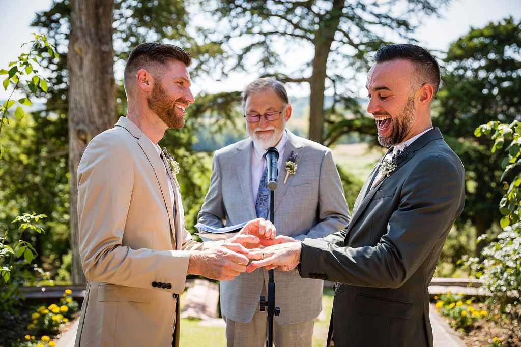Exchanging rings at ceremony